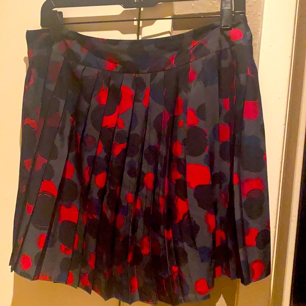 Short, pleated skirt